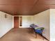 Covered porch area with a table and chairs at 6071 Fairway Ln # 1424, Bradenton, FL 34210