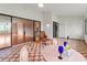 Spacious sunroom with tile flooring, seating, and sliding glass doors for ample natural light at 6071 Fairway Ln # 1424, Bradenton, FL 34210