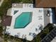 Aerial view of diamond shaped swimming pool with surrounding lounge seating at 6071 Fairway Ln # 1424, Bradenton, FL 34210