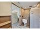 Bathroom and bedroom mid renovation with new flooring and partial drywall installation at 6140 Midnight Pass Rd # B6, Sarasota, FL 34242