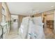 Hallway mid renovation with flooring installed; connecting various rooms throughout the home at 6140 Midnight Pass Rd # B6, Sarasota, FL 34242