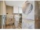 Laundry room under renovation with new washer/dryer in plastic wrap at 6140 Midnight Pass Rd # B6, Sarasota, FL 34242
