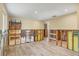 Room under construction, featuring new wood-look floors and exposed framing at 6140 Midnight Pass Rd # B6, Sarasota, FL 34242