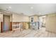 Spacious room under renovation with wood-look flooring and natural light at 6140 Midnight Pass Rd # B6, Sarasota, FL 34242