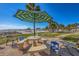 Enjoy shade under this umbrella in the picnic and lounge seating area with beach access at 6140 Midnight Pass Rd # B6, Sarasota, FL 34242