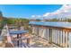 Relaxing deck with seating overlooking tranquil water views, perfect for enjoying the scenery at 6285 Midnight Pass Rd # 101, Sarasota, FL 34242