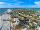 Panoramic aerial view of the neighborhood with beach access and beautiful waterways at 6537 Gulf Of Mexico Dr, Longboat Key, FL 34228