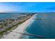Stunning aerial view of waterfront homes along the sandy beach coastline at 6537 Gulf Of Mexico Dr, Longboat Key, FL 34228