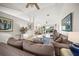 Spacious living room with high ceilings, comfortable seating, and an open layout at 6537 Gulf Of Mexico Dr, Longboat Key, FL 34228
