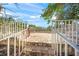 Paver patio with white railings offers an inviting outdoor space with a scenic view at 6537 Gulf Of Mexico Dr, Longboat Key, FL 34228