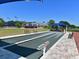 View of bocce ball court with benches and clubhouse at 6726 Fairview Ter # 6726, Bradenton, FL 34203