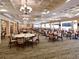 Spacious dining area with elegant chandeliers and ample seating at 6726 Fairview Ter # 6726, Bradenton, FL 34203