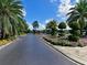 Well-maintained entrance drive, professional landscaping, and colorful flower beds at 6726 Fairview Ter # 6726, Bradenton, FL 34203