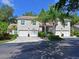 Charming front exterior with a well manicured lawn and large driveways leading to two garages at 6726 Fairview Ter # 6726, Bradenton, FL 34203