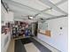 Well organized garage with shelving, storage and fan at 6726 Fairview Ter # 6726, Bradenton, FL 34203