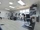 Well-equipped gym with modern machines, free weights, and mounted TV for a complete workout at 6726 Fairview Ter # 6726, Bradenton, FL 34203