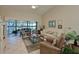 The living room features tile floors, vaulted ceiling, and a glass coffee table at 6726 Fairview Ter # 6726, Bradenton, FL 34203