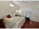 Bright main bedroom features a ceiling fan, high ceilings, and neutral tones at 6726 Fairview Ter # 6726, Bradenton, FL 34203