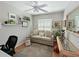 Cozy office space with light gray walls, neutral decor, and a ceiling fan at 6726 Fairview Ter # 6726, Bradenton, FL 34203