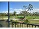 Breathtaking golf course view from the screened lanai, perfect for relaxing and unwinding at 8755 Olde Hickory Ave # 7204, Sarasota, FL 34238