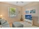 Relaxing living room area with comfortable seating, TV, and a window view at 8755 Olde Hickory Ave # 7204, Sarasota, FL 34238
