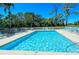 Relax by the community pool, perfect for unwinding and soaking up the sun at 8755 Olde Hickory Ave # 7204, Sarasota, FL 34238