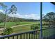 Enjoy the serene water views from this screened lanai, surrounded by lush greenery and golf course at 8755 Olde Hickory Ave # 7204, Sarasota, FL 34238