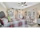Bright bedroom with ample storage, neutral décor, and access to an outdoor patio at 10030 Reagan Dairy Trl, Bradenton, FL 34212