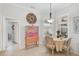 Charming dining area with natural light, decorative furniture, and space for intimate gatherings at 10030 Reagan Dairy Trl, Bradenton, FL 34212