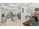 Spacious kitchen featuring a large island, stainless steel appliances, and modern fixtures in an open layout at 10030 Reagan Dairy Trl, Bradenton, FL 34212