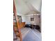 Cozy bedroom featuring hardwood floors, lofted bed, and natural light at 1228 Wagon Wheel Dr, Sarasota, FL 34240