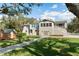 Expansive home with lush green lawn and charming shed, ideal for outdoor enjoyment at 1228 Wagon Wheel Dr, Sarasota, FL 34240