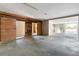 Spacious garage area with rustic barn style doors and storage space at 1228 Wagon Wheel Dr, Sarasota, FL 34240