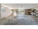 Open garage area featuring a large opening, offering ample natural light and easy access to the outdoors at 1228 Wagon Wheel Dr, Sarasota, FL 34240