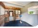 Interior shot of horse stall with wood paneling and window for sunlight and air to come in at 1228 Wagon Wheel Dr, Sarasota, FL 34240