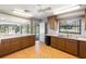 Kitchen featuring ample cabinetry and countertop space overlooking the backyard at 1228 Wagon Wheel Dr, Sarasota, FL 34240