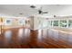 Sun-filled living area with hardwood floors, and neutral paint at 1228 Wagon Wheel Dr, Sarasota, FL 34240
