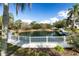 Picturesque pond with fountain and scenic views, enhancing the community's charm at 1228 Wagon Wheel Dr, Sarasota, FL 34240