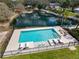 Relaxing outdoor pool with lounge seating and a fenced in pool area at 1228 Wagon Wheel Dr, Sarasota, FL 34240