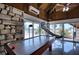 Fun-filled game room with an air hockey table, perfect for recreation and entertainment at 13575 Martha Ave, Port Charlotte, FL 33981