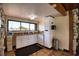 Convenient kitchenette area featuring ample counter space and storage cabinets at 13575 Martha Ave, Port Charlotte, FL 33981