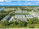 New townhome community boasting manicured landscaping, common green space, and a community pond and easy access to beaches at 17128 Blowfish Dr, Nokomis, FL 34275
