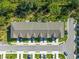 Detailed aerial view of the property highlighting well-maintained landscaping, parking, and convenient access to surrounding areas at 17136 Blowfish Dr, Nokomis, FL 34275