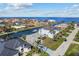 Breathtaking aerial view of a waterfront home nestled among canals and vibrant coastal neighborhood at 23 Ocean Dr, Punta Gorda, FL 33950