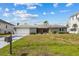 Well-maintained single-story home with manicured lawn and attached garage at 23 Ocean Dr, Punta Gorda, FL 33950
