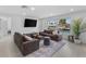 Living room featuring water views, neutral paint, two couches, and a rug at 23 Ocean Dr, Punta Gorda, FL 33950