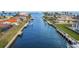 A view of a canal lined with waterfront homes, showcasing the serene boating community at 23 Ocean Dr, Punta Gorda, FL 33950
