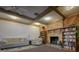 Cozy living room with a brick fireplace and built-in bookshelves, perfect for relaxing at 2625 Pine Lake Ter # B, Sarasota, FL 34237