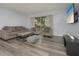 Inviting living room features contemporary furnishings and an open layout at 2625 Pine Lake Ter # B, Sarasota, FL 34237