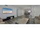 Open-concept living area seamlessly connects the living room to the dining area and kitchen at 2625 Pine Lake Ter # B, Sarasota, FL 34237
